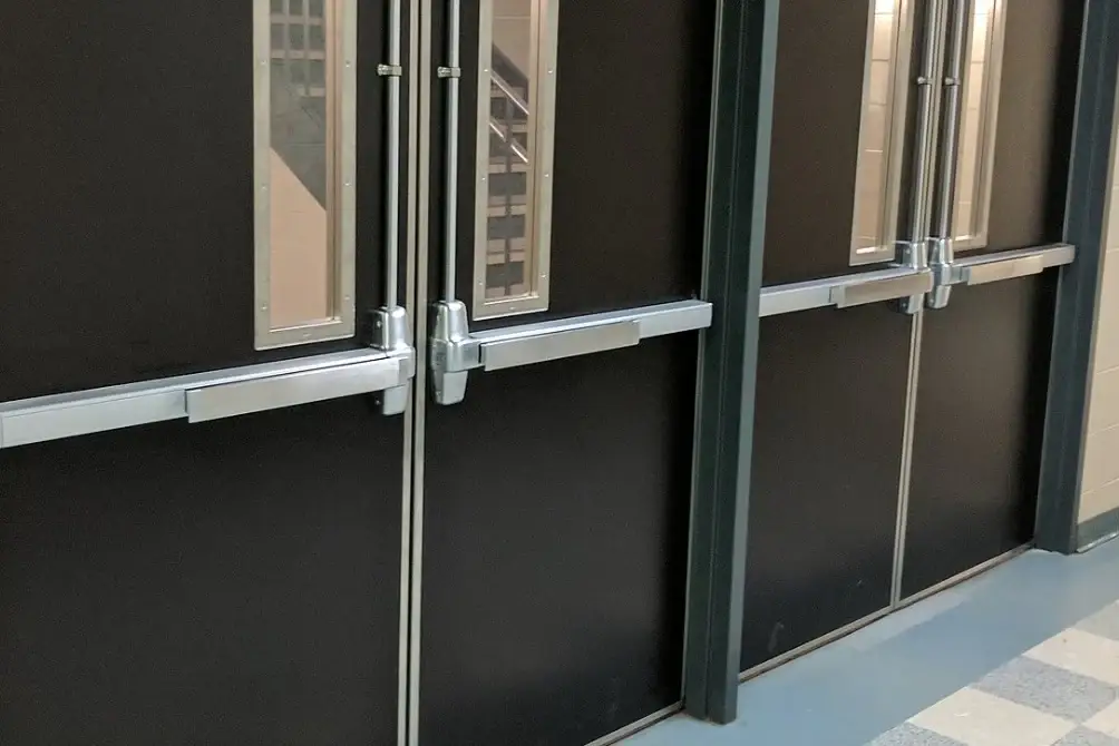 Panic device hardware on double doors, part of our Commercial Service.